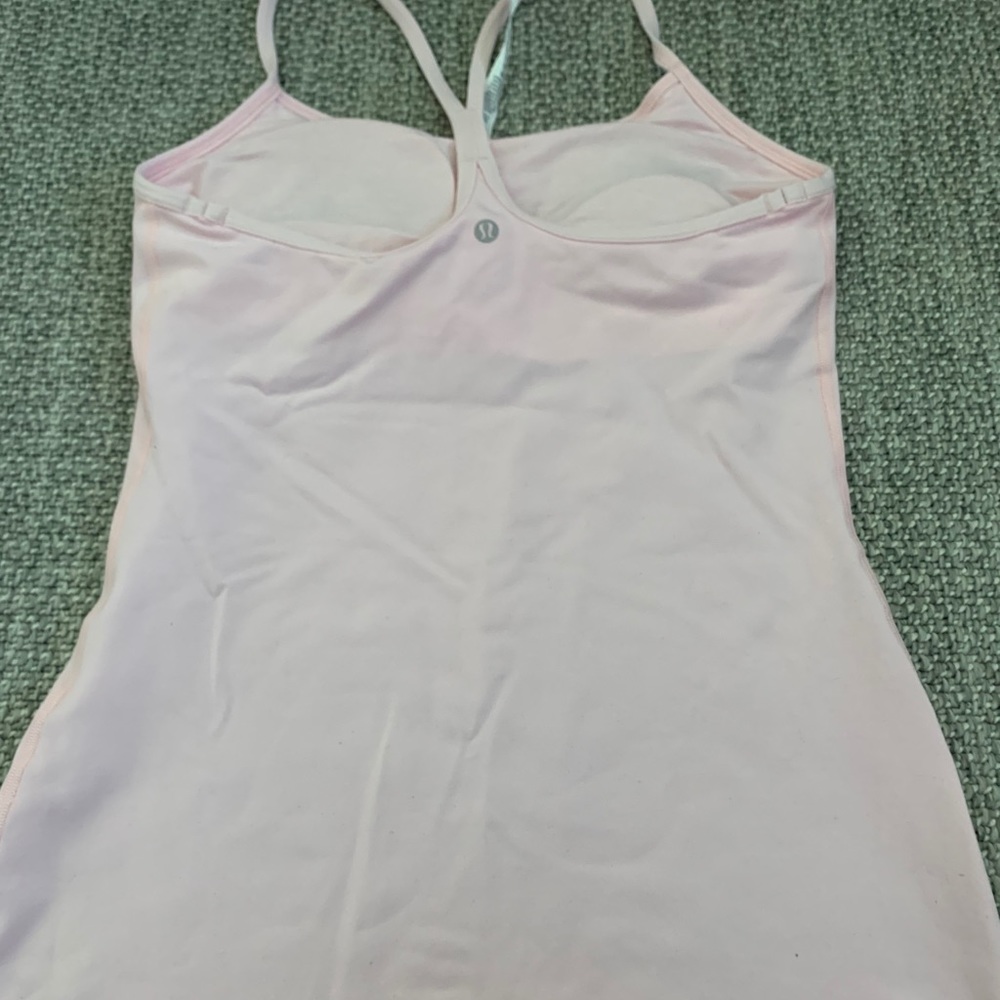 Never worn Lululemon baby pink tank (built in bra)